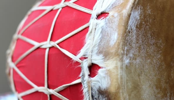 Handcrafted Koboro drum with traditional red fabric